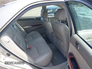 2004 Toyota Camry LE with VIN 4T1BF30K94U587836, listed as a IAAI auction lot 41714277 with 211,893 mi miles and . Bid and sale history available at carsss.com. Image 8.