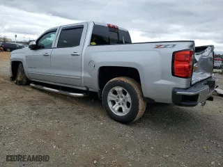 2017 Chevrolet Silverado 1500 LT with VIN 3GCUKREC0HG119774, listed as a Copart auction lot 45701005 with 79,976 mi miles and Salvage Title. Bid and sale history available at carsss.com. Image 2.