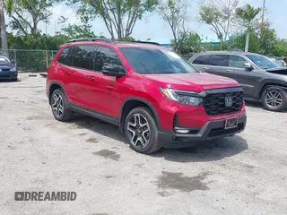 2023 Honda Passport Elite with VIN 5FNYF8H01PB031645, listed as a IAAI auction lot 42495265 with 29,633 mi miles and . Bid and sale history available at DreamBid. Image 1.