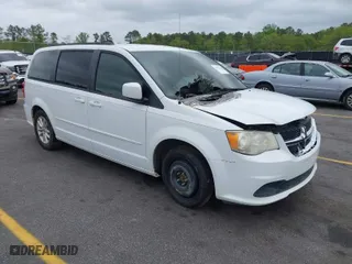 2014 Dodge Grand Caravan SXT with VIN 2C4RDGCG0ER390849, listed as a IAAI auction lot 41957368 with 98,044 mi miles. Bid and sale history available at carsss.com. Image 1.