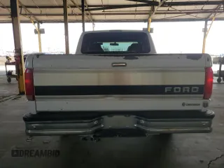1995 Ford F-150 with VIN 1FTEF14H7SLA53001, listed as a Copart auction lot 82024754 with 133,155 mi miles and Salvage Title. Bid and sale history available at carsss.com. Image 6.