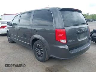 2015 Dodge Grand Caravan American Value with VIN 2C4RDGBG2FR542844, listed as a IAAI auction lot 42109983 with 129,718 mi miles and . Bid and sale history available at DreamBid. Image 3.