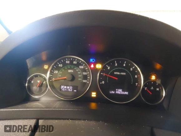 2010 Jeep Grand Cherokee Laredo with VIN 1J4PR4GK7AC126059, listed as a IAAI auction lot 41599058 with 154,192 mi miles. Bid and sale history available at carsss.com. Image 7.