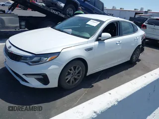 2019 Kia Optima LX with VIN 5XXGT4L30KG335926, listed as a IAAI auction lot 41986835 with 114,309 mi miles. Bid and sale history available at carsss.com. Image 19.