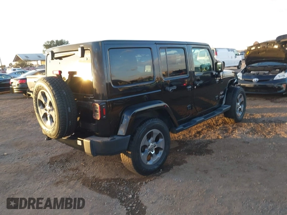 2018 Jeep Wrangler JK Unlimited Sahara with VIN 1C4HJWEG0JL810480, listed as a IAAI auction lot 41260609 with 69,776 mi miles. Bid and sale history available at carsss.com. Image 4.