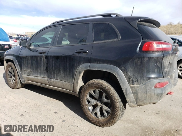 2016 Jeep Cherokee Trailhawk with VIN 1C4PJMBSXGW131199, listed as a Copart auction lot 49292505 with 97,359 mi miles and Salvage Title. Bid and sale history available at DreamBid. Image 2.