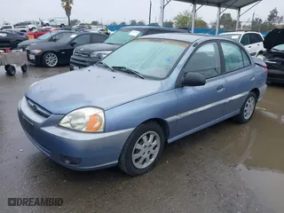 2003 Kia Rio with VIN KNADC125736223027, listed as a IAAI auction lot 41797538 with 25,611 mi miles. Bid and sale history available at carsss.com. Image 17.