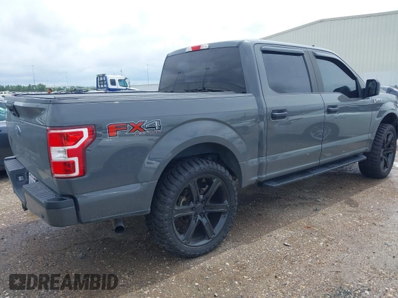 2020 Ford F-150 XL with VIN 1FTEW1EP2LFC53466, listed as a IAAI auction lot 40228156 with 101,101 mi miles. Bid and sale history available at carsss.com. Image 4.