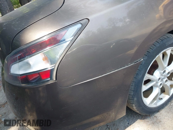 2012 Nissan Maxima S with VIN 1N4AA5AP1CC809218, listed as a IAAI auction lot 42577951 with 98,508 mi miles and . Bid and sale history available at DreamBid. Image 6.
