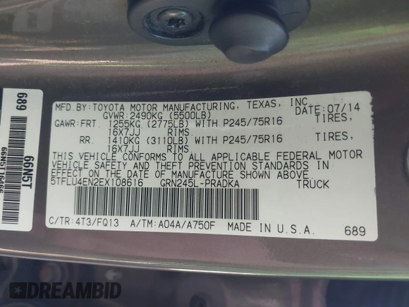 2014 Toyota Tacoma with VIN 5TFLU4EN2EX108616, listed as a IAAI auction lot 42456403 with 112,074 mi miles and . Bid and sale history available at DreamBid. Image 9.