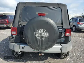 2011 Jeep Wrangler Sahara with VIN 1J4AA5D15BL552185, listed as a Copart auction lot 63065185 with 159,850 mi miles and Salvage title. Bid and sale history available at DreamBid. Image 6.
