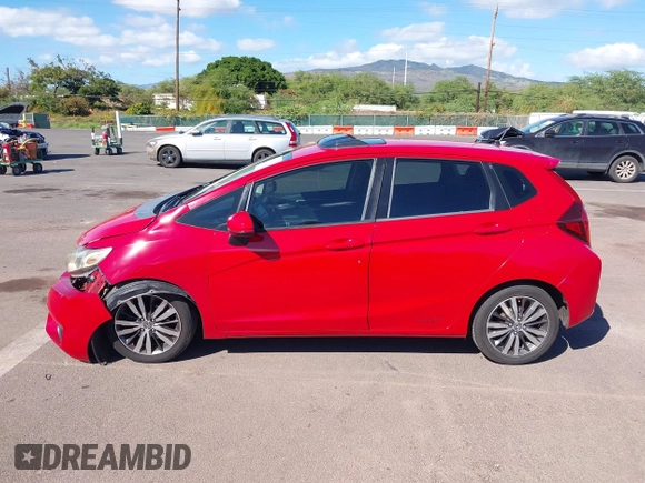 2015 Honda Fit EX-L z VIN 3HGGK5H84FM761279, wystawiony jako IAAI lot #40911141 z przebiegiem 82 217 mil mil oraz . Historia ofert i sprzedaży dostępna na DreamBid. Obrazek 15.