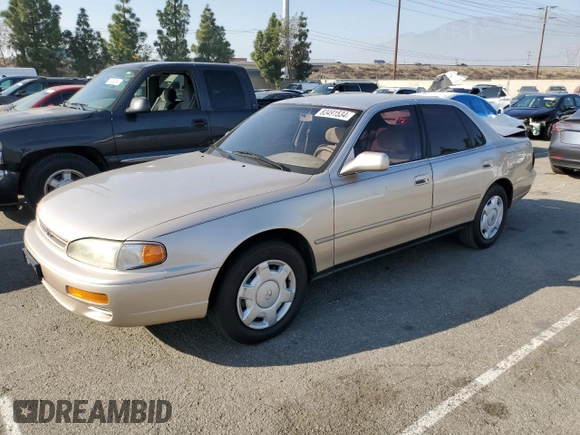 1995 Toyota Camry LE with VIN JT2GK12E7S0107467, listed as a Copart auction lot 83491534 with 112,971 mi miles and Salvage Title. Bid and sale history available at carsss.com. Image 1.