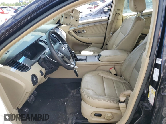 2016 Ford Taurus SEL z VIN 1FAHP2E9XGG117710, wystawiony jako Copart lot #57914095 z przebiegiem 131 344 mil mil oraz Szkoda całkowita • Salvage title. Historia ofert i sprzedaży dostępna na DreamBid. Obrazek 7.