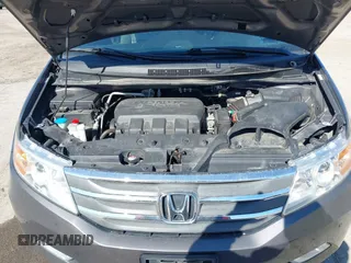 2012 Honda Odyssey Touring with VIN 5FNRL5H9XCB077351, listed as a IAAI auction lot 42045976 with 146,290 mi miles and . Bid and sale history available at DreamBid. Image 10.