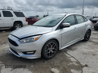 2016 Ford Focus SE z VIN 1FADP3F21GL215411, wystawiony jako Copart lot #65269445 z przebiegiem 35 407 mil mil oraz Szkoda całkowita • Salvage title. Historia ofert i sprzedaży dostępna na DreamBid. Obrazek 1.