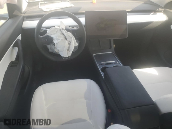 2022 Tesla Model Y Long Range with VIN 7SAYGAEE3NF416838, listed as a Copart auction lot 46157675 with 24,254 mi miles and Salvage Title. Bid and sale history available at DreamBid. Image 8.