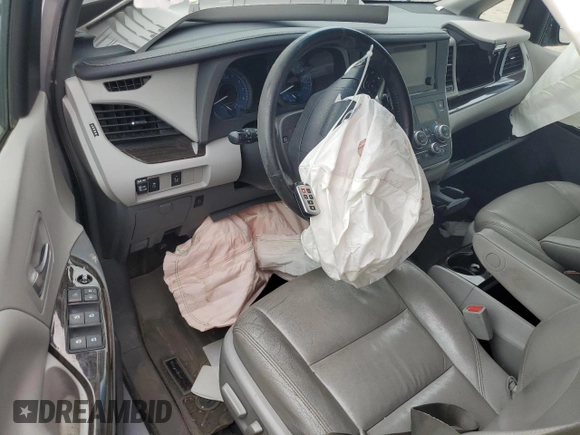 2015 Toyota Sienna XLE с VIN 5TDYK3DC1FS541180, выставлен на аукционе Copart как лот 59078585 с пробегом 94 014 миль миль и Списание • Salvage title. История ставок и продаж доступна на DreamBid. Изображение 8.