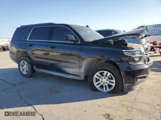 2019 Chevrolet Tahoe LT with VIN 1GNSCBKC4KR132154, listed as a Copart auction lot 42731705 with 77,674 mi miles and Salvage Title. Bid and sale history available at carsss.com. Image 4.