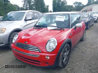 2006 MINI Hardtop with VIN WMWRC33596TK67276, listed as a IAAI auction lot 42488546 with 41,229 mi miles and . Bid and sale history available at DreamBid. Image 2.
