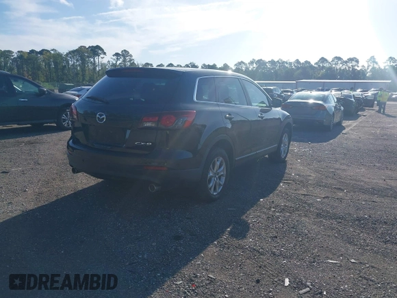 2014 Mazda CX-9 Touring with VIN JM3TB2CA1E0434126, listed as a IAAI auction lot 42639539 with 116,247 mi miles and . Bid and sale history available at DreamBid. Image 4.