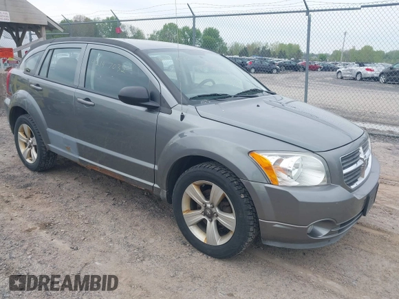 2012 Dodge Caliber SXT with VIN 1C3CDWDA5CD534457, listed as a IAAI auction lot 42197032 with 170,739 mi miles and . Bid and sale history available at DreamBid. Image 1.