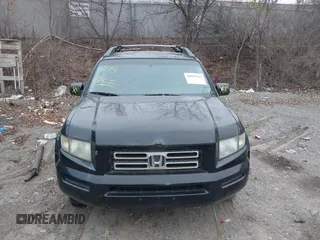 2007 Honda Ridgeline RTL z VIN 2HJYK16527H510681, wystawiony jako IAAI lot #40920924 z przebiegiem Nie podano mil oraz . Historia ofert i sprzedaży dostępna na DreamBid. Obrazek 12.