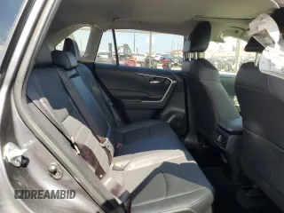 2023 Toyota RAV4 Hybrid XLE Premium z VIN JTMB6RFV5PD080395, wystawiony jako Copart lot #54899515 z przebiegiem 9 190 mil mil oraz Szkoda całkowita • Salvage title. Historia ofert i sprzedaży dostępna na DreamBid. Obrazek 11.