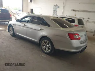 2011 Ford Taurus SEL with VIN 1FAHP2EW6BG170287, listed as a IAAI auction lot 42191702 with 199,477 mi miles. Bid and sale history available at carsss.com. Image 3.