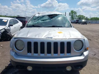 2014 Jeep Patriot Latitude with VIN 1C4NJRFB0ED549410, listed as a IAAI auction lot 42227402 with 139,908 mi miles and . Bid and sale history available at DreamBid. Image 12.
