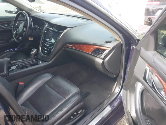2015 Cadillac CTS Luxury AWD with VIN 1G6AX5SX5F0119102, listed as a IAAI auction lot 42231015 with 106,643 mi miles and . Bid and sale history available at DreamBid. Image 5.