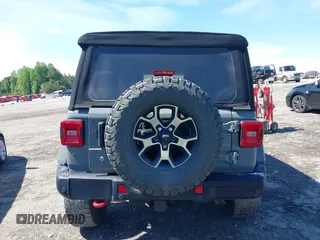 2018 Jeep Wrangler Unlimited Rubicon with VIN 1C4HJXFG6JW267087, listed as a IAAI auction lot 42235058 with 93,962 mi miles and . Bid and sale history available at DreamBid. Image 15.
