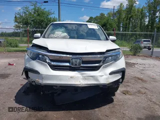 2019 Honda Pilot EX-L with VIN 5FNYF5H42KB026108, listed as a IAAI auction lot 42387593 with 112,556 mi miles and . Bid and sale history available at DreamBid. Image 6.