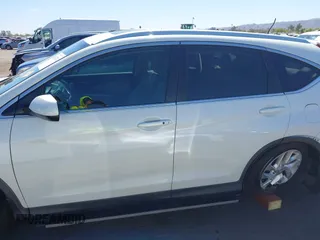 2015 Honda CR-V EX-L with VIN 5J6RM3H74FL016430, listed as a IAAI auction lot 42147267 with 117,656 mi miles and . Bid and sale history available at carsss.com. Image 13.