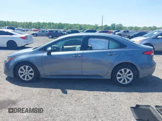 2023 Toyota Corolla LE z VIN JTDB4MEE7PJ002731, wystawiony jako IAAI lot #42155242 z przebiegiem 53 394 mil mil oraz . Historia ofert i sprzedaży dostępna na DreamBid. Obrazek 14.