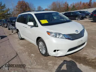 2014 Toyota Sienna Ltd with VIN 5TDDK3DC0ES090160, listed as a IAAI auction lot 41763998 with 160,508 mi miles. Bid and sale history available at carsss.com. Image 1.