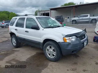 2003 Ford Escape XLT Popular 2 with VIN 1FMYU93193KC06499, listed as a IAAI auction lot 42192640 with 180,095 mi miles and . Bid and sale history available at DreamBid. Image 1.