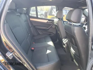 2018 BMW X4 M40i with VIN 5UXXW7C54J0Z44932, listed as a Copart auction lot 55973605 with 101,479 mi miles and Salvage title. Bid and sale history available at DreamBid. Image 11.