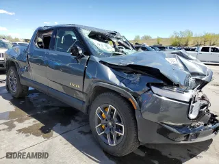 2023 Rivian R1T Launch Edition with VIN 7FCTGAALXPN020447, listed as a Copart auction lot 54154844 with 9,527 mi miles and Non Repairable. Bid and sale history available at carsss.com. Image 4.