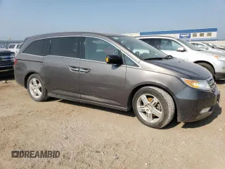 2013 Honda Odyssey with VIN 5KBRL589XDB803471, listed as a Copart auction lot 64465504 with Not provided miles and Non repairable. Bid and sale history available at DreamBid. Image 4.