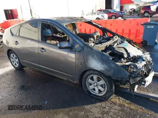 2008 Toyota Prius z VIN JTDKB20U483394646, wystawiony jako IAAI lot #41247368 z przebiegiem Nie podano mil oraz . Historia ofert i sprzedaży dostępna na DreamBid. Obrazek 1.