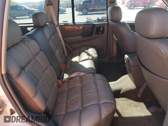 1995 Jeep Grand Cherokee Limited with VIN 1J4GZ78Y3SC701103, listed as a Copart auction lot 72038184 with 143,829 mi miles and Salvage Title. Bid and sale history available at carsss.com. Image 11.