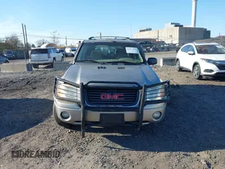 2002 GMC Envoy SLT with VIN 1GKDT13S822304832, listed as a IAAI auction lot 40874054 with 132,883 mi miles. Bid and sale history available at carsss.com. Image 12.