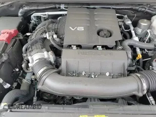 2023 Nissan Frontier SV with VIN 1N6ED1FK9PN653056, listed as a Copart auction lot 57102365 with 27,454 mi miles and Salvage title. Bid and sale history available at DreamBid. Image 13.