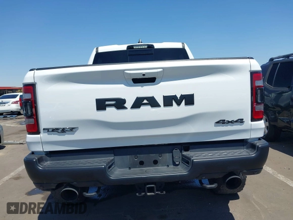 2022 Ram 1500 TRX with VIN 1C6SRFU95NN245954, listed as a IAAI auction lot 42032210 with 30,870 mi miles and . Bid and sale history available at DreamBid. Image 16.