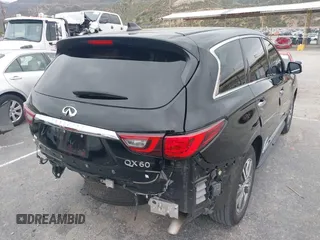 2020 Infiniti QX60 Luxe with VIN 5N1DL0MN2LC540608, listed as a IAAI auction lot 42187929 with 82,227 mi miles and . Bid and sale history available at DreamBid. Image 4.