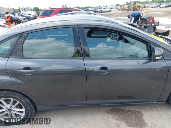 2017 Ford Focus SE with VIN 1FADP3F23HL232809, listed as a IAAI auction lot 42117700 with 104,802 mi miles and . Bid and sale history available at DreamBid. Image 13.