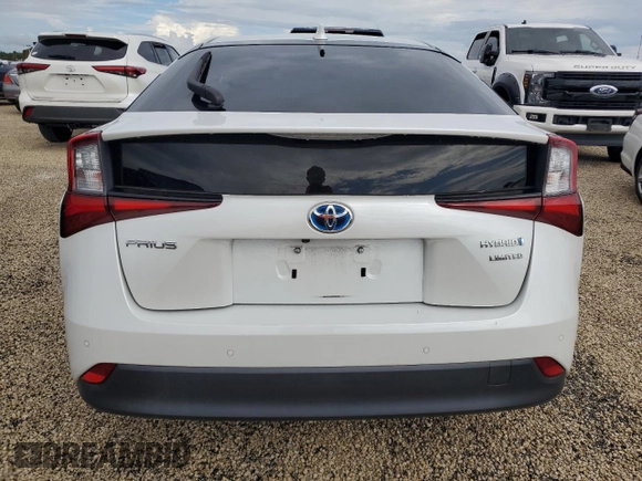2021 Toyota Prius L Eco с VIN JTDKAMFU5M3142128, выставлен на аукционе Copart как лот 73832324 с пробегом 21 460 миль миль и Списание • Salvage title. История ставок и продаж доступна на DreamBid. Изображение 6.