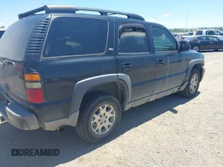 2005 Chevrolet Tahoe LT z VIN 1GNEK13T35R116833, wystawiony jako IAAI lot #42508302 z przebiegiem 254 759 mil mil oraz . Historia ofert i sprzedaży dostępna na DreamBid. Obrazek 4.