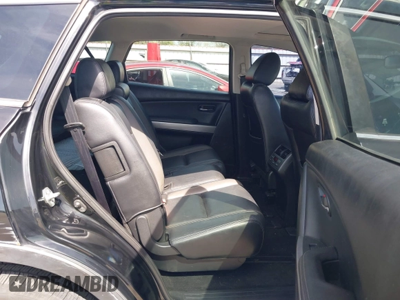 2011 Mazda CX-9 Grand Touring with VIN JM3TB3DA5B0300784, listed as a IAAI auction lot 41816110 with 138,523 mi miles and . Bid and sale history available at DreamBid. Image 8.